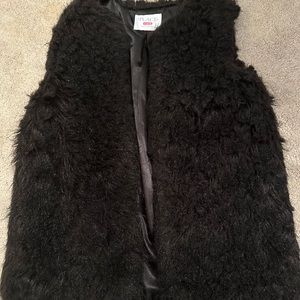 black fuzzy vest